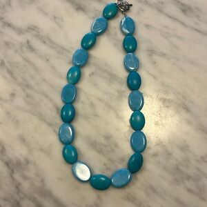 Turquoise colored beaded necklace 21”